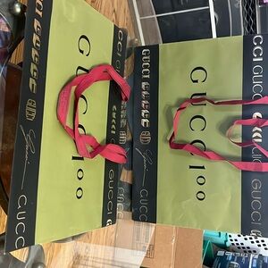 Two Gucci 100 large shopping bags